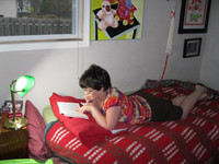  The author's daughter reads a book. 