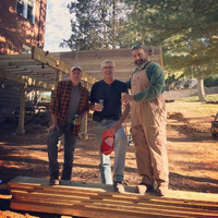  The author's dad and high school English teacher worked with her husband to put a deck on their house. Photo credit: Bonnie Jean Feldkamp. 