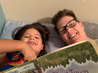  The author reads with her son. Photo credit: Bonnie Jean Feldkamp 