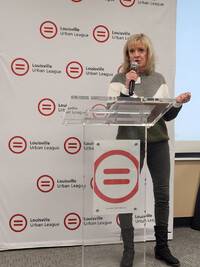 Di Kerrigan, co-founder of Listen, Learn, Act speaks at the Louisville Urban League. Photo courtesy of Di Kerrigan