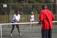  Aretha Fuqua, Ed.D., plays tennis at historic Chickasaw Park. Photo courtesy of Olmstead Parks Conservancy 