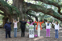  Community members gathered under the Angel Oak to celebrate the acquisition of the surrounding land, paving the way for the future Angel Oak Preserve. Pictured from left to right: Richard "Shorty" Legare, Lorna Hattler, Pastor Bob Capers, Queen Quet, Elizabeth Hagood, Elizabeth Brown and Samantha Siegel. Photo Credit: Lowcountry Land Trust 