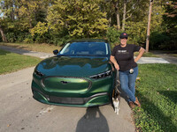  Bonnie Jean Feldkamp poses with her Electric Vehicle, a Ford Mustang Mach-E Photo Credit: Bonnie Jean Feldkamp 