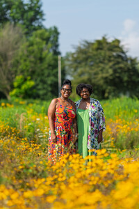  Mariel Gardner and Wynette McElvaney Young pose for a photo at the Muhammad Ali Butterfly and Bee Pollinator Garden in Chickasaw Park. Photo Credit: Quincy Brents 