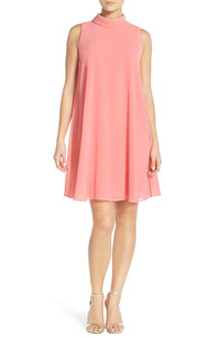  Swing into spring in a retro-inspired chiffon trapeze dress by Vince Camuto. 