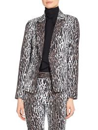 Animal prints roam in exotic patterns this spring for a winning look from St. John Knits. www.stjohnknits.com.