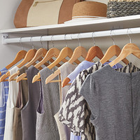 Matching hangers can set the tone for an organized closet. ClosetMaid custom-designed closets at www.homedepot.com.