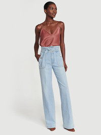 Try out the latest denim trends include wide-legged flared jeans with a high waist. Shown: the Ali Tie Wide Leg Triple Waist Tie from FRAME.
