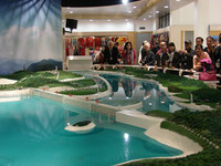 Century Legend passengers learn from a model about the Three Gorges Dam on the Yangtze River. Photo courtesy of Sandra Scott.