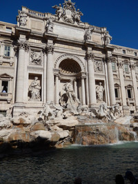 Travelers who visit Rome's Trevi Fountain often throw in coins in the hope of a return visit. Photo courtesy of Glenda Winders.