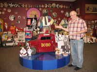  Greg DeSanto, executive director of the International Clown Hall of Fame and Research Center in Baraboo, Wisconsin, shows off some of the organization's treasures. Photo courtesy of Glenda Winders. 