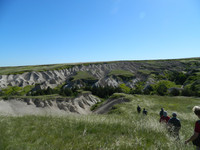 Hikers approach a canyon in the Oglala National Grasslands in the Nebraska Panhandle. Photo courtesy of Steve Bergsman.