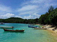  Fishing boats lie tied up on Iboih beach on the small island of Pulau Weh, less than a mile's ferry ride from Banda Aceh on the mainland of Indonesia. Photo courtesy of Tim Carl. 