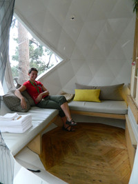  A visitor relaxes in the Sphere, one of the accommodations at Parc Aventures Cap Jaseux in the Saguenay/Lac-Saint-Jean region of Quebec, Canada. Photo courtesy of Steve Bergsman. 