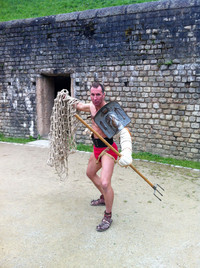  Holding classes in the Roman Amphitheater in Trier, Germany, Jan Kruger promises students in his gladiator-training school "to taste the dust of the arena and feel the adrenaline rush." Photo courtesy of Sharon Whitley Larsen. 