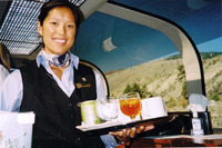  Complimentary beverage service brought to dome car passengers at their seats is included in the Rocky Mountaineer's GoldLeaf service. Photo courtesy of Sharon Whitley Larsen. 