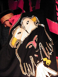 Native dancers tell the story of their tribe in a longhouse during a shore excursion in Alaska. Photo courtesy of Sheila Sobell.