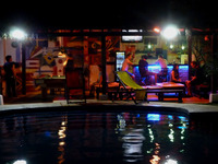  The pool and bar at The Dreamer Hostel in Santa Marta, Colombia, make it a gathering spot for travelers at night as well as during the day. Photo courtesy of Stuart Wasserman. 