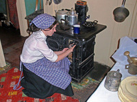  An interpreter at the Tenement Museum in New York City shows visitors what life was like for early immigrants to the United States. Photo courtesy of Victor Block. 