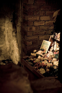  Visitors still leave toys to honor a little girl who died in Mary King's Close in Edinburgh, Scotland, during the age of the bubonic plague. Photo courtesy of the Real Mary King's Close Consortium. 