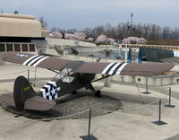 A restored L-3 observation plane is on display at the National D-Day Memorial near Bedford, Virginia. Photo courtesy of the Roanoke Valley Convention and Visitors Bureau.