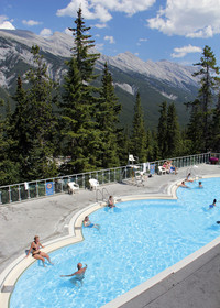 The pool at Banff Hot Springs in Alberta, Canada, offers a superb mountain view. Photo courtesy of www.hansentravel.org.