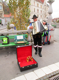  . A street performer entertains visitors to Ljubljana, Slovenia. Photo courtesy of Victor Block. 