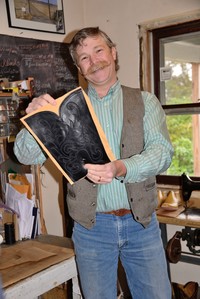 . Kyle Rosfeld, boot-maker extraordinaire in Cody, Nebraska, hand-stitches all his masterpieces on the 1897 sewing machine seen behind him. Photo courtesy of Priscilla Lister.
