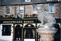  The statue of Greyfriars Bobby is located in front of the bar named for Edinburgh, Scotland's, beloved dog. Photo courtesy of Sharon Whitley Larsen. 