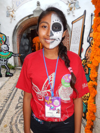  An altar to honor a deceased employee at the Xel-Ha park in Riviera Maya, Mexico, includes some of her favorite photos and objects. Photo courtesy of Glenda Winders. 