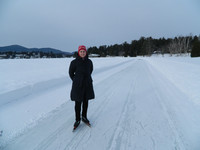 Christie Sausa enjoys a quiet moment while giving an ice-skating lesson to a novice. Photo courtesy of Steve Bergsman.