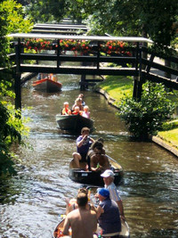  Cars are prohibited in the Netherlands village of Giethoorn, so everyone travels through the canals. Photo courtesy of the Netherlands Board of Tourism and Conventions. 