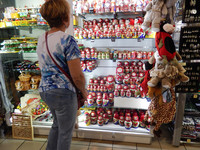  Julie Kean, a passenger aboard Grand Circle's MS River Aria, decides on souvenirs at the Central Market Hall in Budapest, Hungary. Photo courtesy of Glenda Winders. 