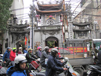  Ancient walls and gates provide a sharp contrast to modern life in Hanoi, Vietnam. Photo courtesy of Barbara Selwitz. 