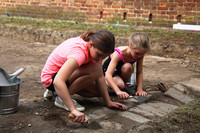  Children "help" as archaeologists continue to uncover artifacts in Colonial Williamsburg, Virginia. Photo courtesy of Victor Block. 