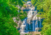 High Falls, like nearly every other of the several hundred waterfalls in Transylvania County, North Carolina, is what locals call "a set of falls" - waterfalls interspersed with multiple drops above, below and alongside one another. Photo copyrighted by Fred J. Eckert.
