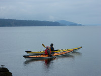 Kayakers brave a wintery day off the northern coast of Salt Spring Island, British Columbia. Photo courtesy of Steve Bergsman.