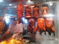 Tantalizing fresh-cooked meats at award-winning HK BBQ Master in Richmond, British Columbia, tease passersby. Photo courtesy of Athena Lucero.