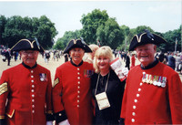  Author Sharon Whitley Larsen enjoys the company of the famed Beefeaters &#8212; or Yeoman Warders &#8212;following a Trooping the Colour ceremony. Photo courtesy of Carl Larsen. 
