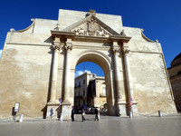 The grand Arch of Triumph, or Porta Napoli, leads into the most compelling part of Lecce in the southern part of Italy. Photo courtesy of Richard N. Every.