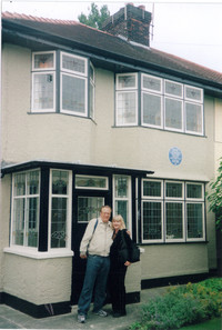 The author and her husband, Carl, pose in front of John Lennon's childhood home in Liverpool, England. Photo courtesy of Sharon Whitley Larsen.