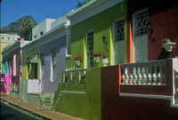 Table Mountain looms behind this colorful neighborhood in Cape Town, South Africa. Photo courtesy of Halina Kubalski.