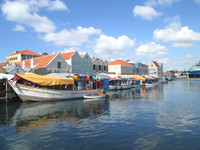 A floating market lies close to the Queen Juliana Bridge in Willemstad, Curacao. Photo courtesy of Victor Block.