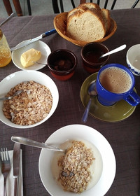 A hearty breakfast at Alpe Rompiago in the Ticino area of Switzerland includes yogurt and oats, fresh-baked bread, butter and marmalade made on the farm. Photo courtesy of Athena Lucero.