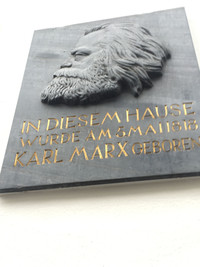 Outside the birth home of Karl Marx in Trier, Germany, a plaque commemorates its famous resident. Photo courtesy of Carl H. Larsen.