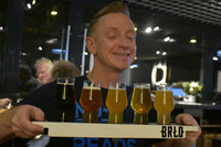  Gastro-Rallye guide Henrik Tidefjard presents flights of craft beer at the BRLO Brwhouse in Berlin, Germany. Photo courtesy of Candyce Stapen. 