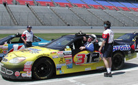 At the end of his drive at the Richard Petty Driving Experience at the Texas Motor Speedway the author exits his car through a window. Photo courtesy of Bill Neely.