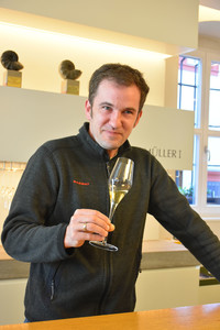 Christian Muller, vintner of Max Muller I winery in Volkach, Germany, samples a glass of his wine. </p>
<p>Photo courtesy of Candyce H. Stapen.