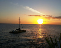 Visitors to Negril, Jamaica, don't want to miss a sunset at Rick's Cafe. Photo courtesy of Fyllis Hockman. 