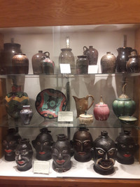 A collection of rare African-American face jugs from the 1920s is on display at the Wilkes Heritage Museum in Wilkesboro, North Carolina. Photo courtesy of Steve Bergsman.